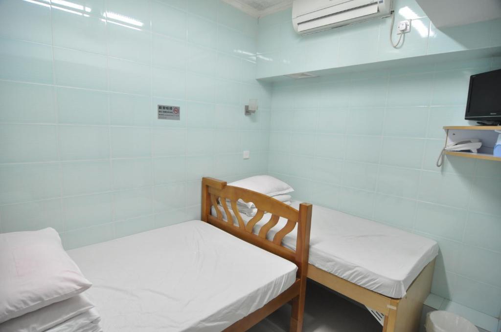 Oi Suen Guesthouse Χονγκ Κονγκ Δωμάτιο φωτογραφία